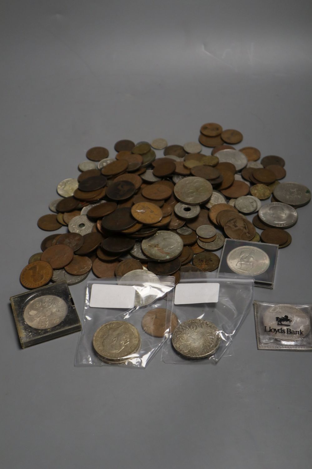 A small collection of coins, including a Tibet, Guang Xu, Szechuan, Rupee, 1902-11,